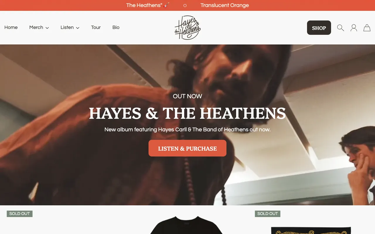 The Hayes & The Heathens homepage: an orange scrolling announcement bar, a simple menu with a Shop button, and a full-width video hero with a Listen and Purchase button.