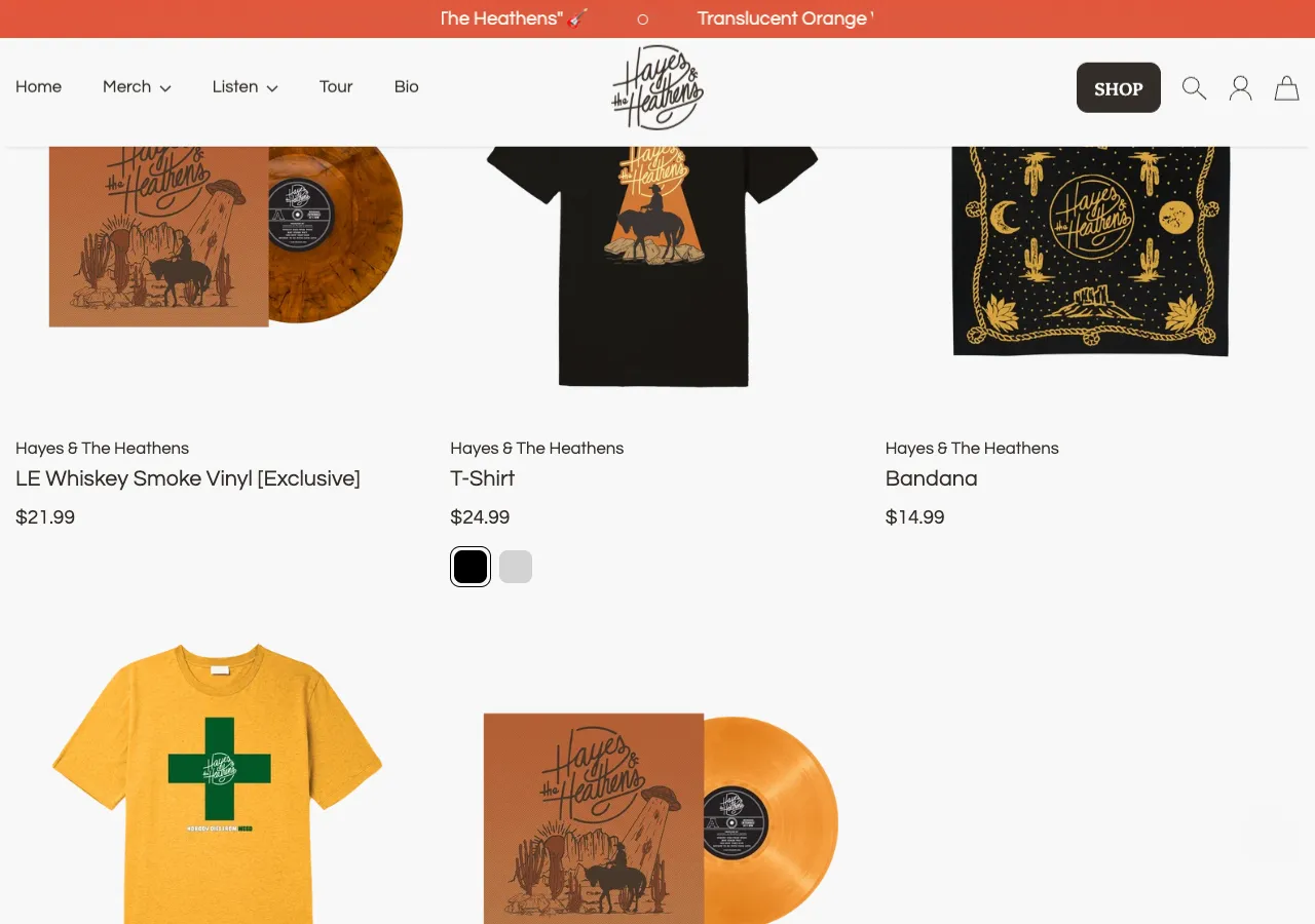The store grid: whiskey smoke vinyl, a black tee and a bandana on the first row, a yellow tee and the translucent orange vinyl below.
